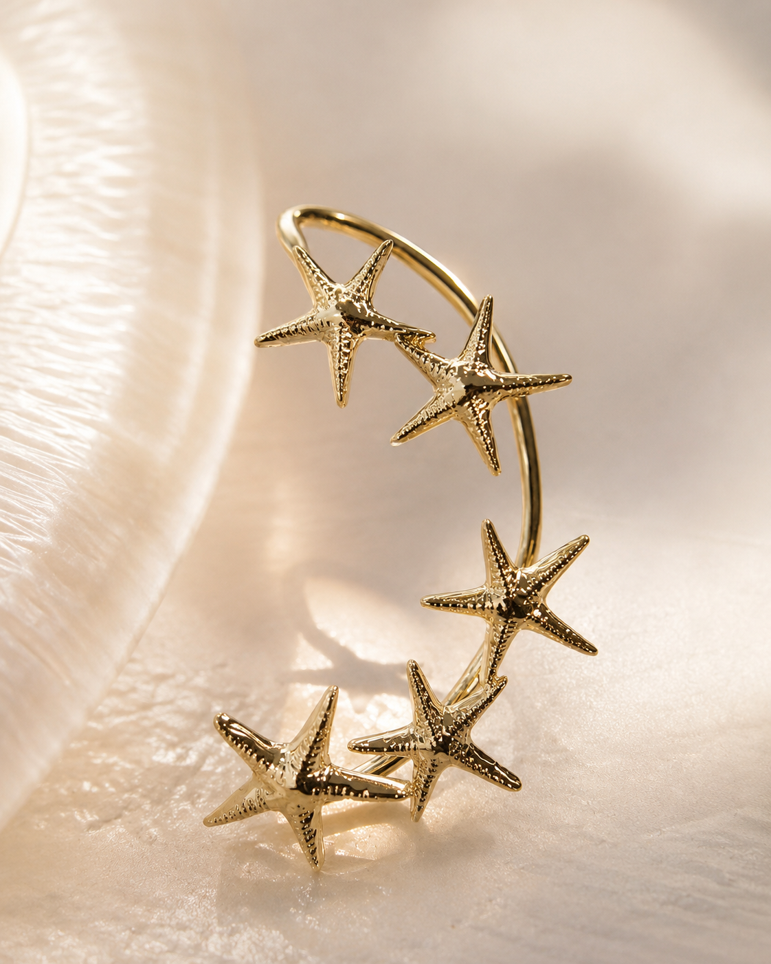 Constellation ear cuff in gold